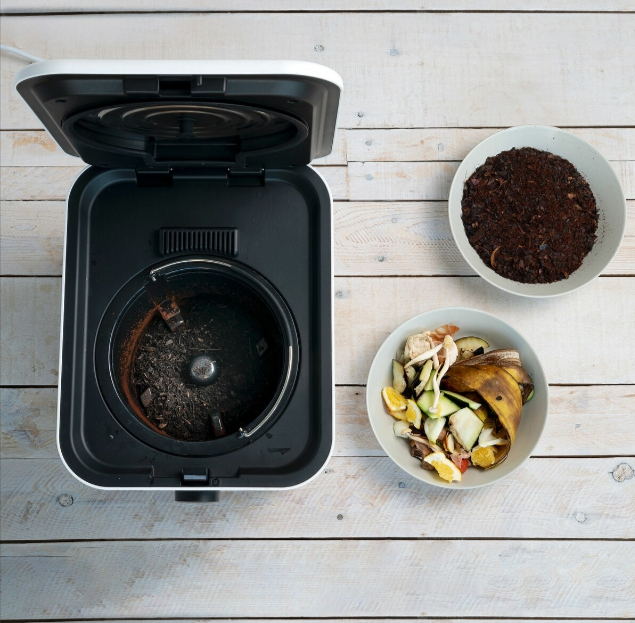 Binnenzijde van de Compostsmart met het driedubbele mes